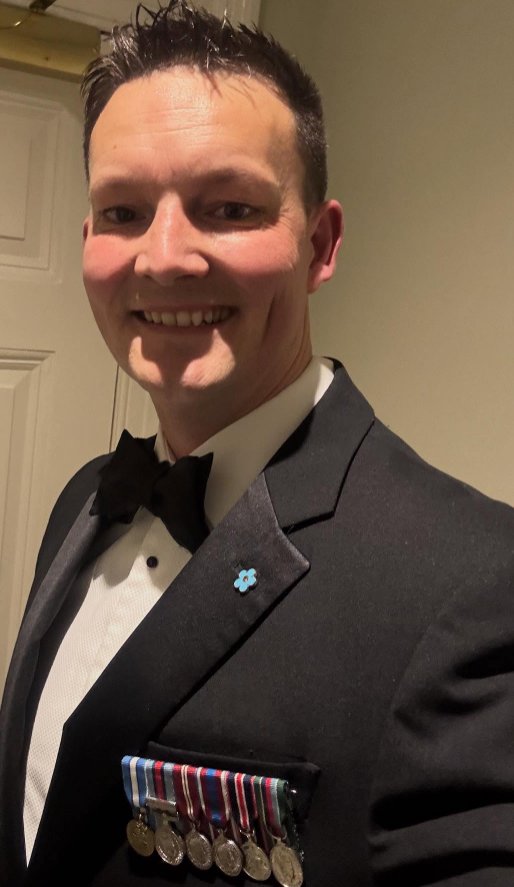 Stephen Marshall VR in formal evening dress with miniature service medals